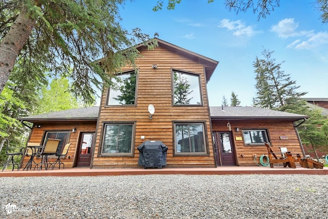 34952 Treeline Ave, Soldotna, AK 99669 - back of house with roof with shingles
