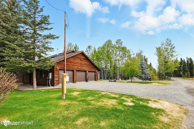 34952 Treeline Ave, Soldotna, AK 99669 - view of front of house featuring a front yard and gravel driveway