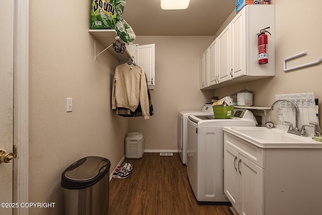 9650 E Forest Grove Cir # 10B, Palmer, AK 99645 - laundry area with washer and clothes dryer, dark wood finished floors, cabinet space, and baseboards