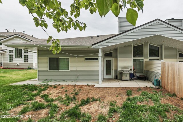 9650 E Forest Grove Cir # 10B, Palmer, AK 99645 - back of property featuring a patio area and a shingled roof