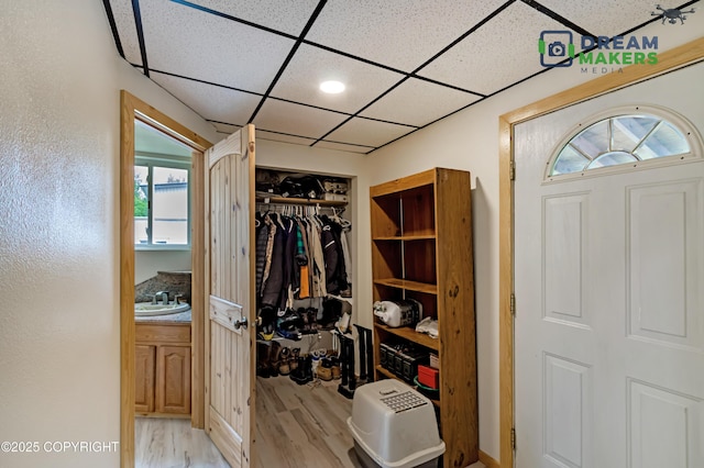 3745 W Machen Rd, Wasilla, AK 99623 - spacious closet with light wood-style floors and a drop ceiling