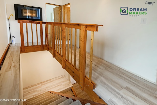3745 W Machen Rd, Wasilla, AK 99623 - stairway featuring wood finished floors