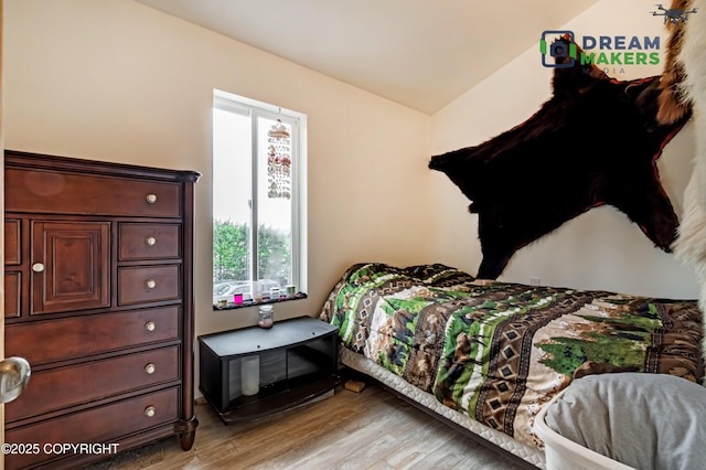3745 W Machen Rd, Wasilla, AK 99623 - bedroom featuring light wood-style floors