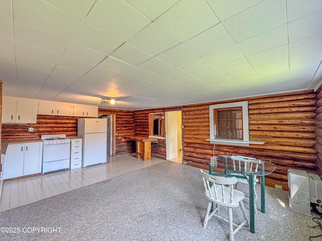 4075 Mattox Rd, Homer, AK 99603 - unfurnished living room with rustic walls and a fireplace