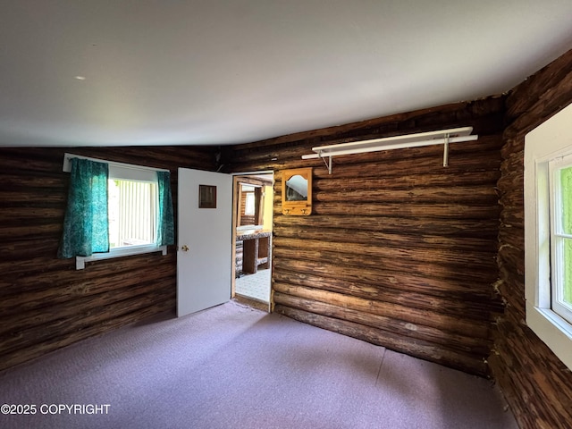 4075 Mattox Rd, Homer, AK 99603 - carpeted empty room featuring log walls