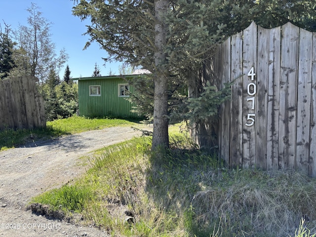 4075 Mattox Rd, Homer, AK 99603 - view of property exterior featuring dirt driveway
