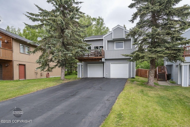 19113 Sarichef Loop, Eagle River, AK 99577 - view of front of house featuring asphalt driveway, a garage, and a front yard