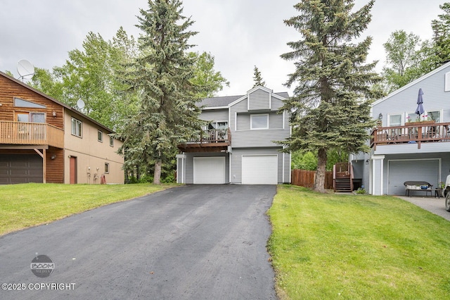 19113 Sarichef Loop, Eagle River, AK 99577 - view of front of home featuring asphalt driveway, a garage, and a front yard