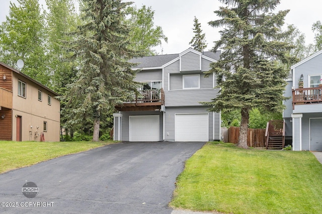 19113 Sarichef Loop, Eagle River, AK 99577 - view of front of house featuring a garage, driveway, and a balcony