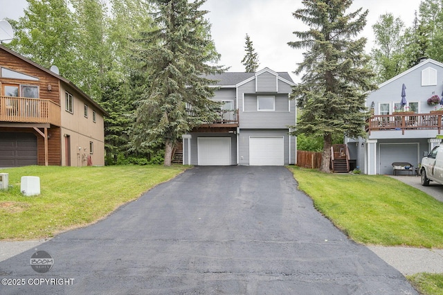 19113 Sarichef Loop, Eagle River, AK 99577 - view of front facade with driveway, a garage, and a front lawn