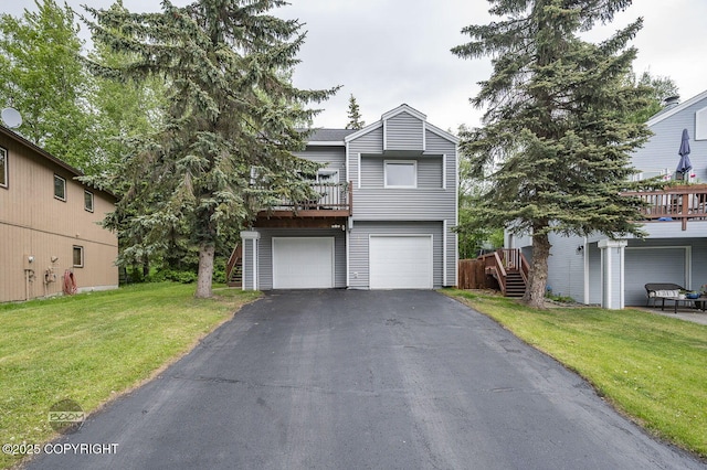 19113 Sarichef Loop, Eagle River, AK 99577 - view of front of property featuring driveway, stairs, an attached garage, a front yard, and a wooden deck