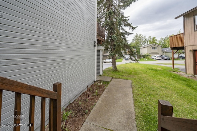 19113 Sarichef Loop, Eagle River, AK 99577 - view of side of property featuring a lawn