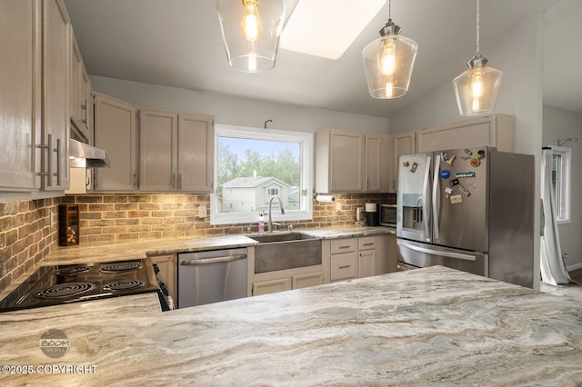 19113 Sarichef Loop, Eagle River, AK 99577 - kitchen featuring appliances with stainless steel finishes, a sink, tasteful backsplash, light stone counters, and pendant lighting