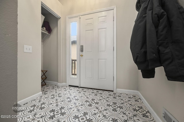19113 Sarichef Loop, Eagle River, AK 99577 - mudroom featuring baseboards
