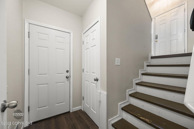 19113 Sarichef Loop, Eagle River, AK 99577 - foyer with dark wood-style floors, stairway, and baseboards