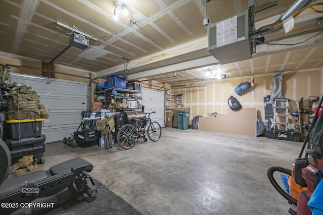 19113 Sarichef Loop, Eagle River, AK 99577 - garage with a garage door opener and a heating unit