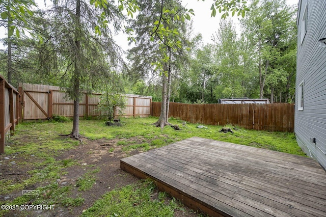 19113 Sarichef Loop, Eagle River, AK 99577 - view of yard featuring a wooden deck