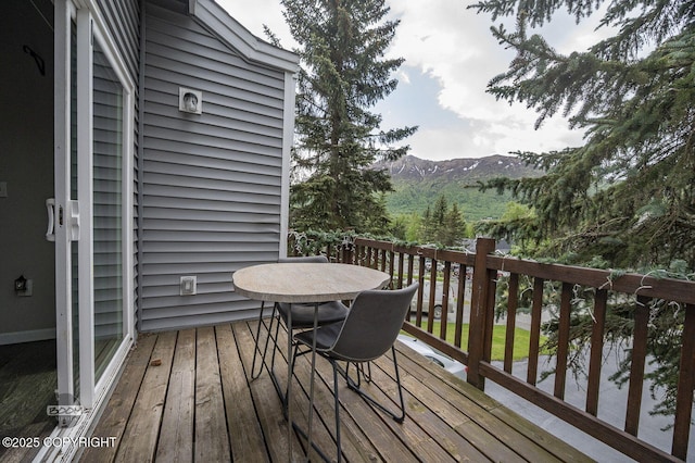 19113 Sarichef Loop, Eagle River, AK 99577 - deck featuring outdoor dining space and a mountain view