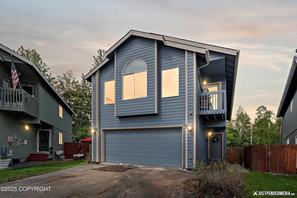 1843 Colony Pl # 27, Anchorage, AK 99507 - view of front of property with a balcony, concrete driveway, and an attached garage