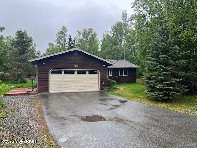 12944 Ridgeview Dr, Anchorage, AK 99516 - rustic home featuring driveway and a garage