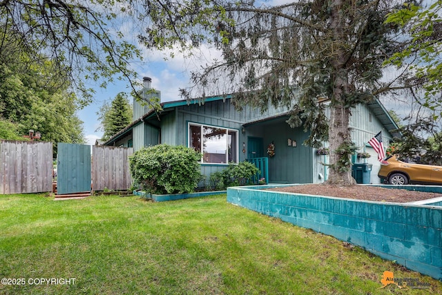 4139 Cosmos Dr, Anchorage, AK 99517 - view of front facade with a chimney