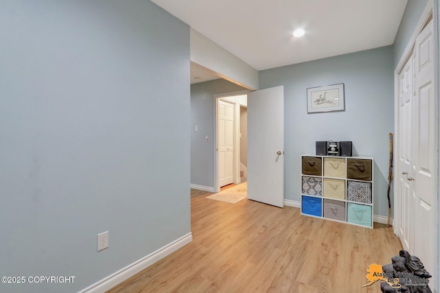 218 Deerfield Dr, Anchorage, AK 99515 - bedroom featuring light wood-style flooring and baseboards