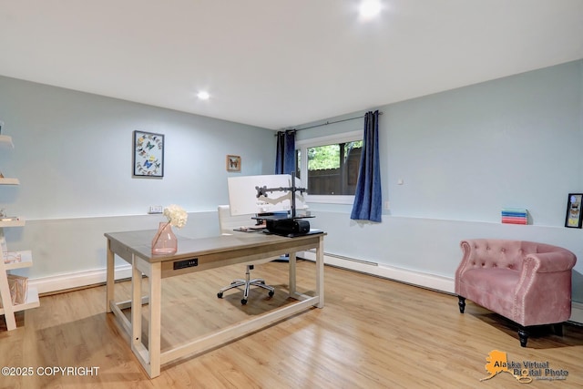 218 Deerfield Dr, Anchorage, AK 99515 - home office featuring a baseboard heating unit, wood finished floors, and baseboard heating