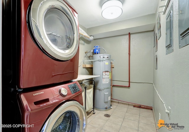 218 Deerfield Dr, Anchorage, AK 99515 - laundry area with estacked washer and dryer, water heater, and tile patterned floors