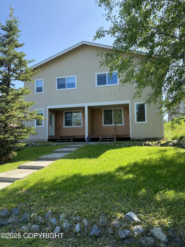 4309 Garfield St, Anchorage, AK 99503 - view of front of home with a front yard