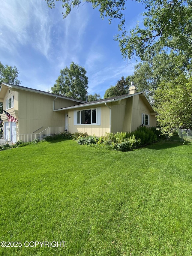 3316 Vassar Dr, Anchorage, AK 99508 - view of front facade with a chimney