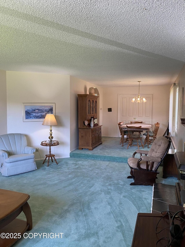 3316 Vassar Dr, Anchorage, AK 99508 - living area featuring carpet flooring, a chandelier, and a textured ceiling