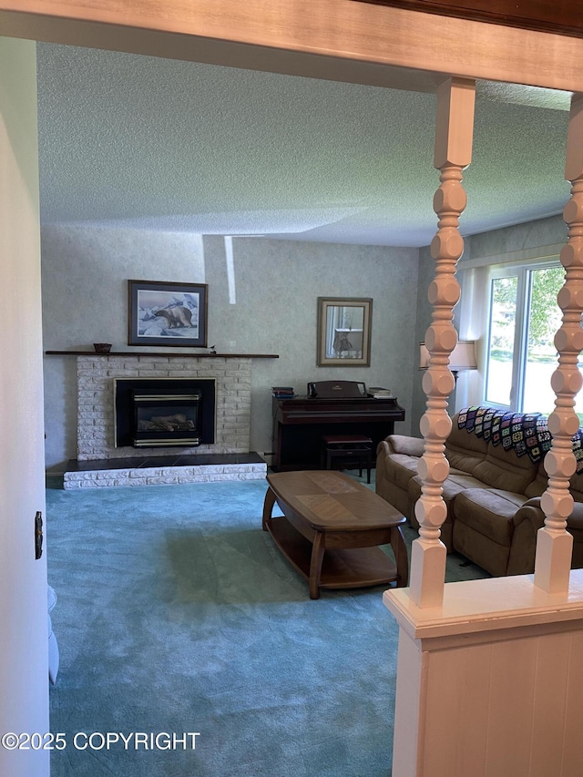 3316 Vassar Dr, Anchorage, AK 99508 - living area featuring carpet flooring, a textured ceiling, and a fireplace