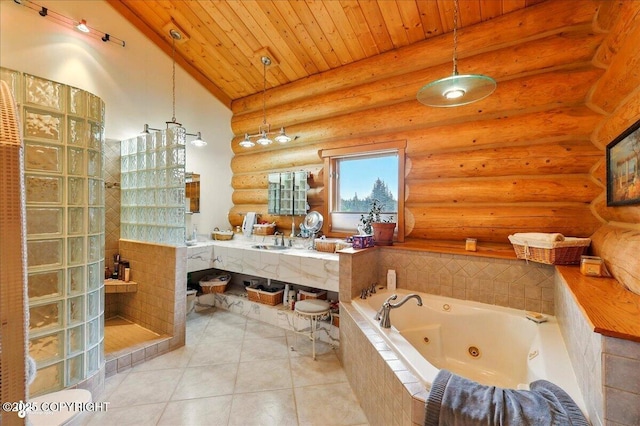 22325 Sterling Hwy, Ninilchik, AK 99639 - bathroom featuring a tub with jets, a sink, walk in shower, tile patterned flooring, and lofted ceiling