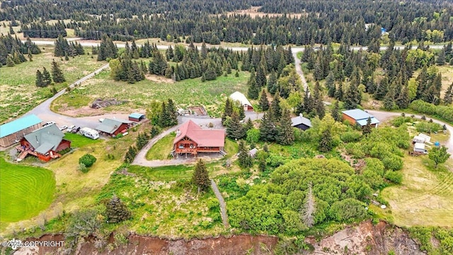 22325 Sterling Hwy, Ninilchik, AK 99639 - aerial overview of property's location with a heavily wooded area