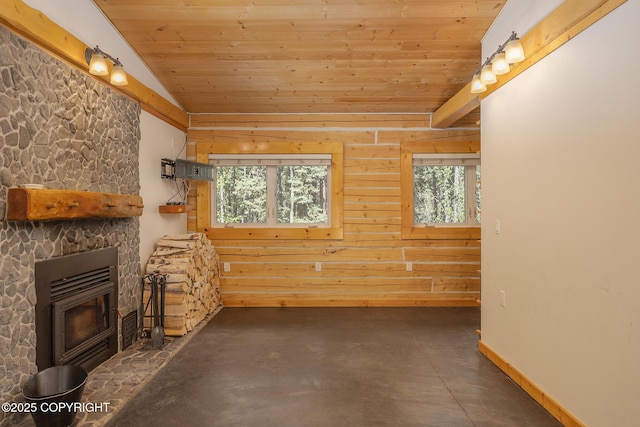 2390 Hermits Way N, Pole, AK 99705 - unfurnished living room featuring vaulted ceiling, wood ceiling, concrete flooring, baseboards, and wood walls