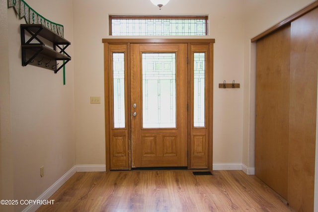11838 N Hagion Shores Dr, Willow, AK 99688 - foyer featuring baseboards and light wood-type flooring
