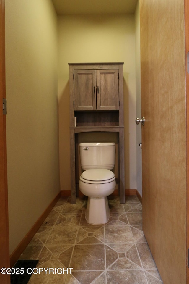 11838 N Hagion Shores Dr, Willow, AK 99688 - bathroom featuring toilet and baseboards