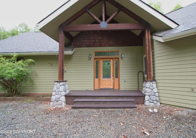 11838 N Hagion Shores Dr, Willow, AK 99688 - view of exterior entry with a shingled roof and a porch