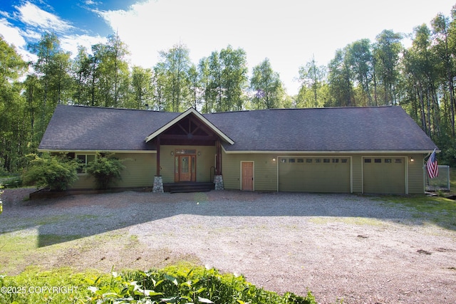 11838 N Hagion Shores Dr, Willow, AK 99688 - single story home with driveway, an attached garage, and roof with shingles
