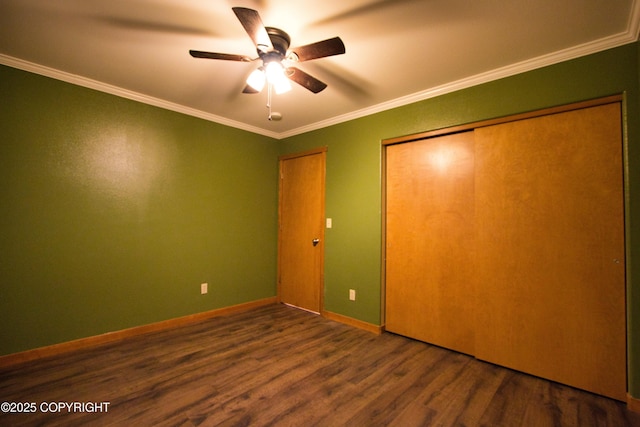 11838 N Hagion Shores Dr, Willow, AK 99688 - unfurnished bedroom featuring wood finished floors, ornamental molding, a ceiling fan, and a closet