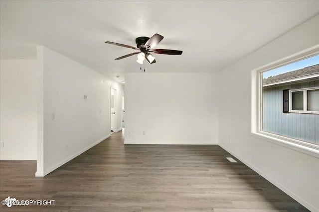 557 N Glenn Hwy, Palmer, AK 99645 - unfurnished room with ceiling fan, wood finished floors, and baseboards
