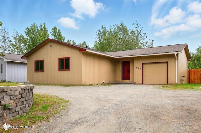 557 N Glenn Hwy, Palmer, AK 99645 - single story home with driveway, a garage, and roof with shingles