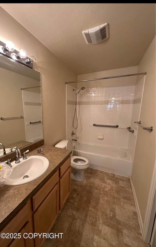 7252 Glade Pl # 4, Anchorage, AK 99518 - full bathroom with  shower combination, vanity, and a textured ceiling