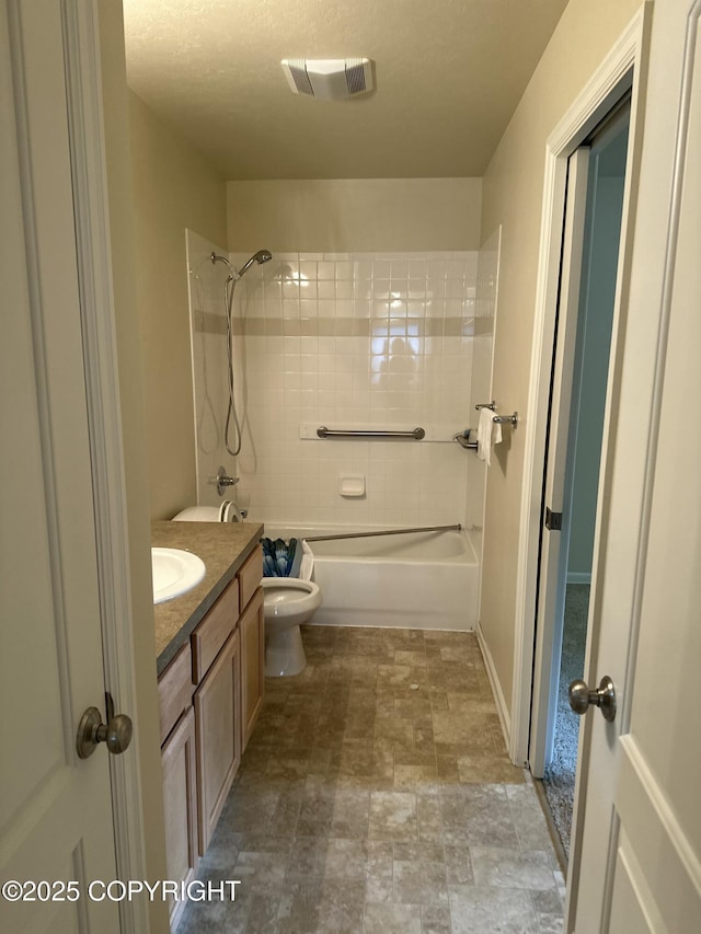 7252 Glade Pl # 4, Anchorage, AK 99518 - full bathroom featuring vanity, tub / shower combination, and stone finish flooring