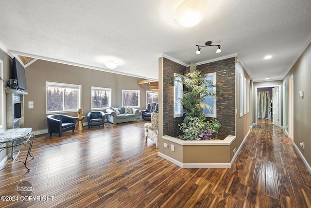 4745 Manytell Ave, Anchorage, AK 99516 - hallway with ornamental molding, a textured ceiling, wood finished floors, and baseboards