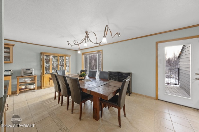 4745 Manytell Ave, Anchorage, AK 99516 - dining area with a chandelier, ornamental molding, baseboards, and light tile patterned flooring
