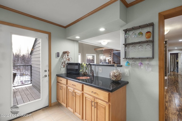 4745 Manytell Ave, Anchorage, AK 99516 - kitchen with a sink, crown molding, recessed lighting, and dark stone countertops