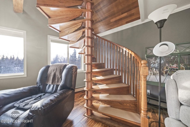 4745 Manytell Ave, Anchorage, AK 99516 - stairway with wood finished floors and a baseboard heating unit