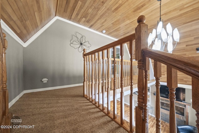4745 Manytell Ave, Anchorage, AK 99516 - staircase featuring wooden ceiling, a chandelier, lofted ceiling, carpet floors, and baseboards