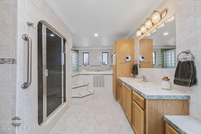 4745 Manytell Ave, Anchorage, AK 99516 - bathroom with crown molding, vanity, a garden tub, healthy amount of natural light, and tile walls